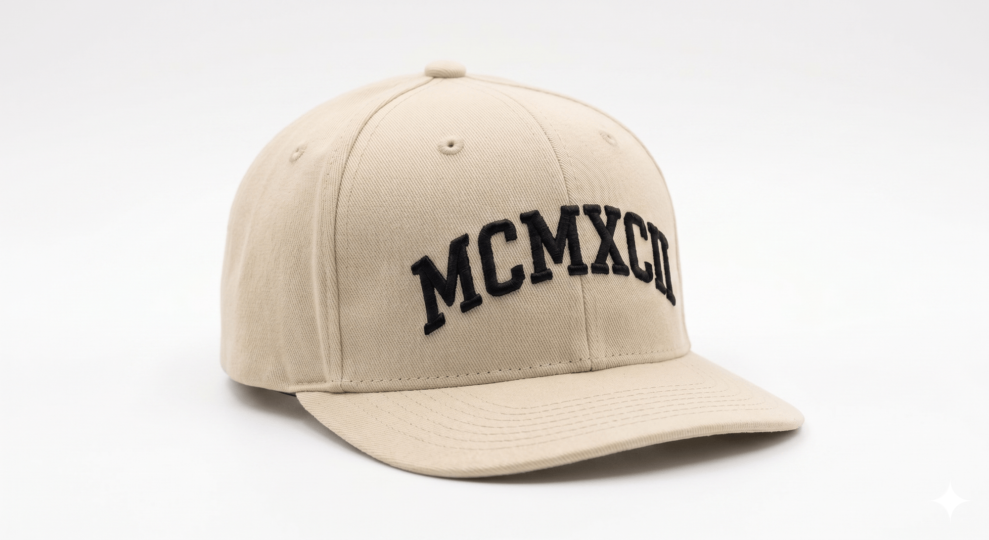 The MCMXCII Signature Cap — front view, MCMXCII embroidery in black on Sand Cream